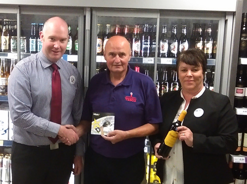 Team members receive special recognition from Tesco